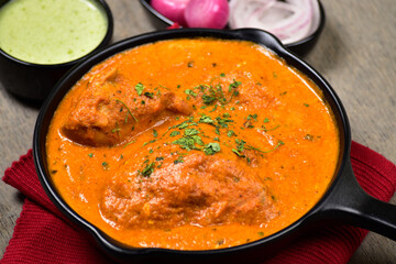Closeup of butter chicken in plate, Punjabi food