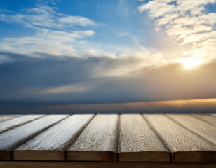 Empty wooden table against the backdrop of a blurred blue sky sunrise background. High quality photo
