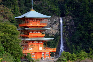 Seianto-ji Temple Pagoda against the backdrop of the Nachi Falls at Nachisan, Nachikatsuura,...