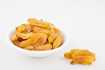 Closeup of raisin in bowl isolated on white background