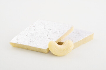 Closeup of Kaju katli sweet on white background