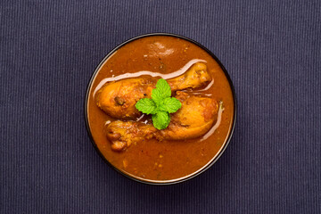 Top view of chicken curry in bowl, tari wala murga