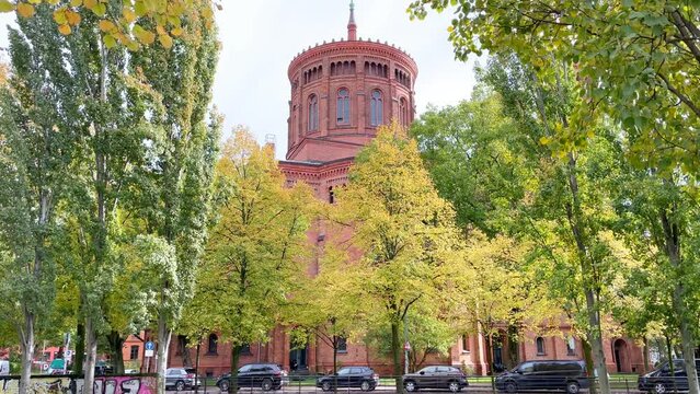 Autumn Scenery in Berlin with Yellow Trees around Old Church in Germany