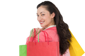 Digital png photo of happy caucasian woman with shopping bags on transparent background