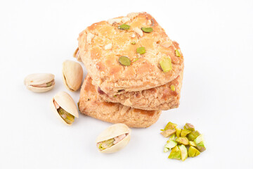Closeup of pistachio biscuit on white background