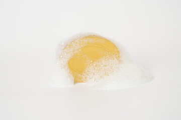 Glycerin soap with froth isolated on white background
