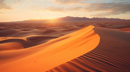 Fototapeta na wymiar A vast desert landscape with sand dunes casting long shadows under a setting sun.