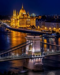Fototapeta na wymiar Illuminated aerial view of Budapest, Hungary, at night with the Chain Bridge over the Danube River