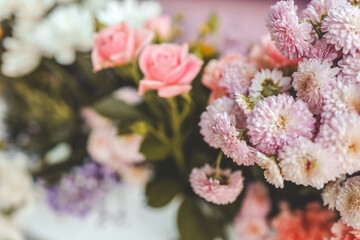 Fototapeta premium bouquet of garden flowers, top view. floral greeting card with dahlias and lavaters, natural background