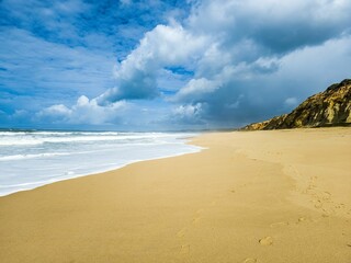 Idyllic beach in Lagoa de Albufeira, Sesimbra, Lisbon, Portugal, with a view of the Atlantic Ocean