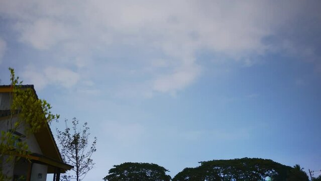 timelapse landscape and nature concept with lot of star and night sky with house and tree