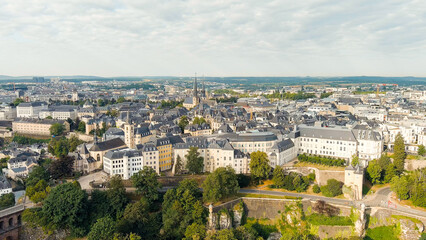 Fototapeta na wymiar Luxembourg City, Luxembourg. Panoramic view of the historical part of Luxembourg city. The city is located in a deep valley of two rivers - Alzette and Petrus, Aerial View