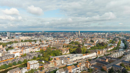 Fototapeta na wymiar Ghent, Belgium. Panorama of the central city from the air. Cloudy weather, summer day, Aerial View