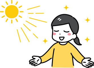 両手を広げて日光を浴びる私服の若い女性