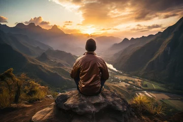 Foto op Canvas Male yogi meditating on top of a mountain © Michael
