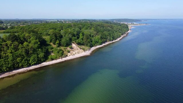 Aerial drone footage of forwards flight over beautiful coastline at the Baltic Sea in Northern Germany
