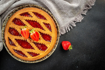 Piece of strawberry pie on a dark background, banner, menu, recipe place for text, top view - obrazy, fototapety, plakaty