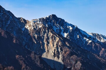 Fototapeta premium 冠雪の北アルプスの白馬岳