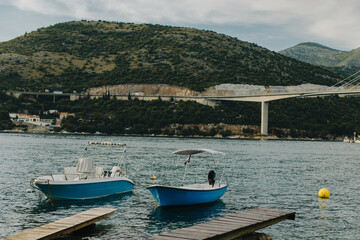 Fototapeta na wymiar Boats in the Adriatic sea near Dubrovnik city, Croatia. Travel destination in Croatia.