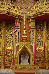 Fototapeta premium Art of entrance door and Bai Sema is the Buddhist boundary of Wat Tham Suea is a temple and tourist attraction have large Buddha image. is a top of hill. Located at Kanchanaburi Province in Thailand.