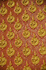 Texture and background Architecture decorate exterior and building antique design of Buddhism Thai church.