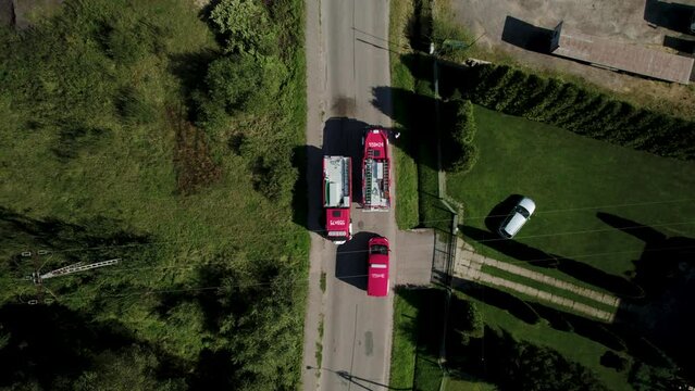Bird Eye View of Fire Trucks Passing Each Other on the Narrow Road 4k