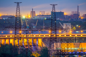 Industrial view with powerlines, Dneproges hydroelectric dam, cargo port and metallurgical plants in Zaporizhzhia, Ukraine
