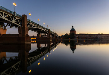 Bridge of Pont Saint-Pierre with Dôme de La Grave at sunset, Toulouse, France