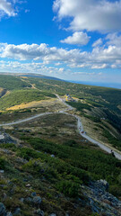Naklejka premium Mountain hiking trail lined with stones in Poland, climbing Sniezka Mountain