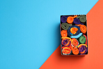 Casual clothes and wearing concept - socks, clothes for foot