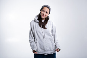 Portrait of attractive cheerful girl demonstrating copy empty space ad advert isolated over white background