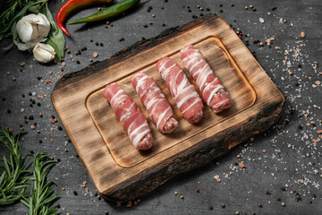 Beef kebab wrapped in bacon.