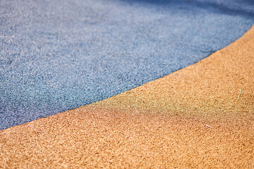 Special rubber coating for the playground or sports activity. Junction of multicolored pieces of...