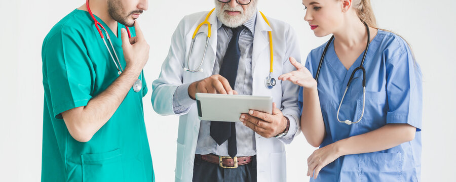 Group of doctor with tablet on white background Medical and healthcare technology concept