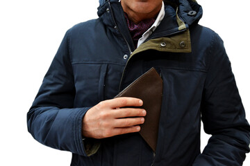 a man in a hooded jacket puts his wallet in his pocket