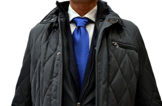 man in a gray jacket, blue jacket, shirt and tie