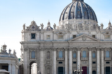 Fragment of Basilica of St. Peter in the Vatican and column on Saint Peters square in Vatican