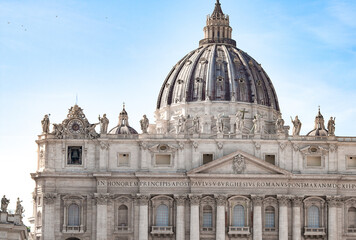 Fototapeta na wymiar Vatican city, Italy - October 3, 2023: Facade of St. Peter's Basilica with Statues of saints in the Vatican, Rome, Italy
