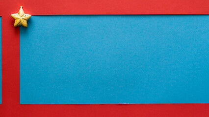 Dark blue color background with paper texture and a red ribbon