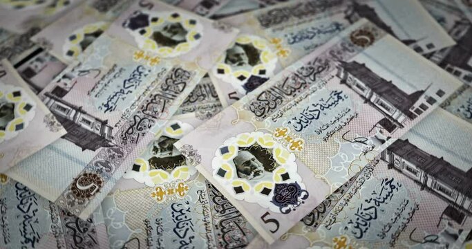 Libya Dinar growing pile of money. LYD banknotes loop rotaring. Seamless and looped background concept of finance, economy crisis, inflation and business.