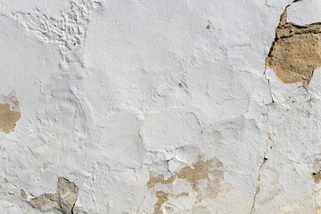 white plastered wall with broken part as background