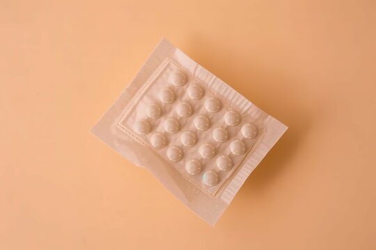 Contraceptive patch safety on pastel background. Prevention safe birth calendar care. Generate Ai