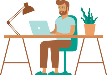 Young man working with laptop at home