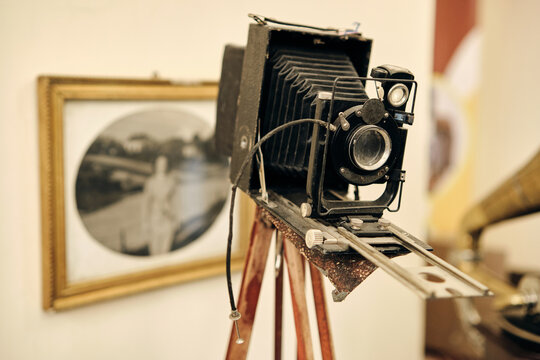 Vintage wooden box camera on a tripod