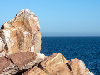 View of the Atlantic Ocean over a rock formation in Pringle Bay, Western Cape
