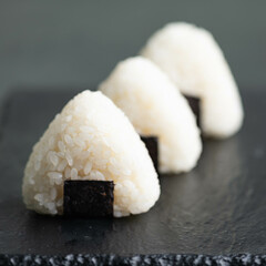 Onigiri, rice balls, traditional japanese dish, selective focus