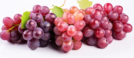 Fototapeta premium A cluster of grapes on a white background