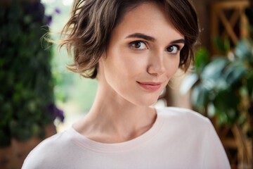 Fototapeta premium Cropped closeup photo of business lady smiling nice cute day first her new cafeteria memories portrait isolated blurred office background