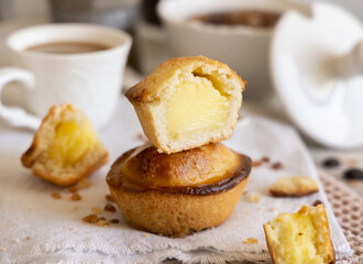 Pasticciotto leccese pastry filled with egg custard cream on a napkin close up