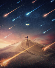 Mystical hero with red cape in the desert watching a meteor shower approaching. Mysterious celestial phenomena, apocalyptic scene - obrazy, fototapety, plakaty